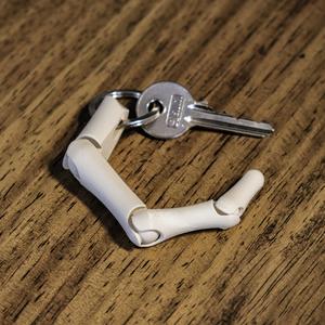 Finger bone keychain