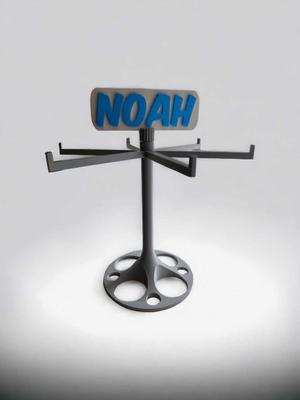 Rotating keychain display with tag on top