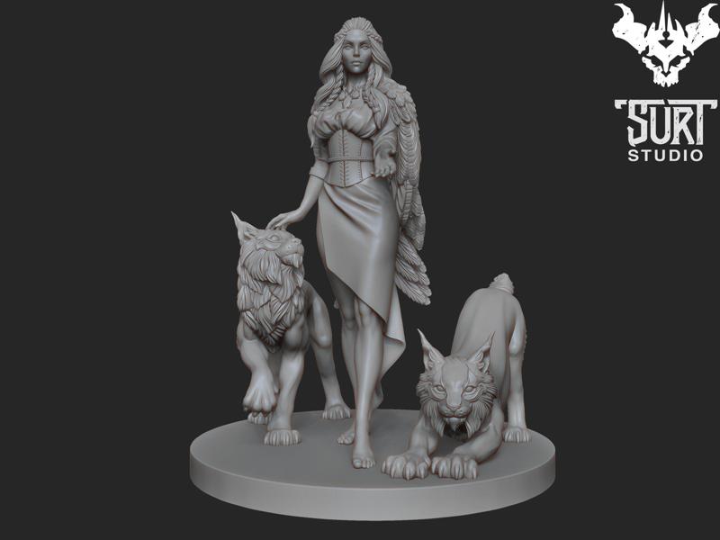 Freya statue of woman with two wolves
