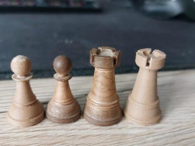 Chess pieces: Queen, Rook and Pawn