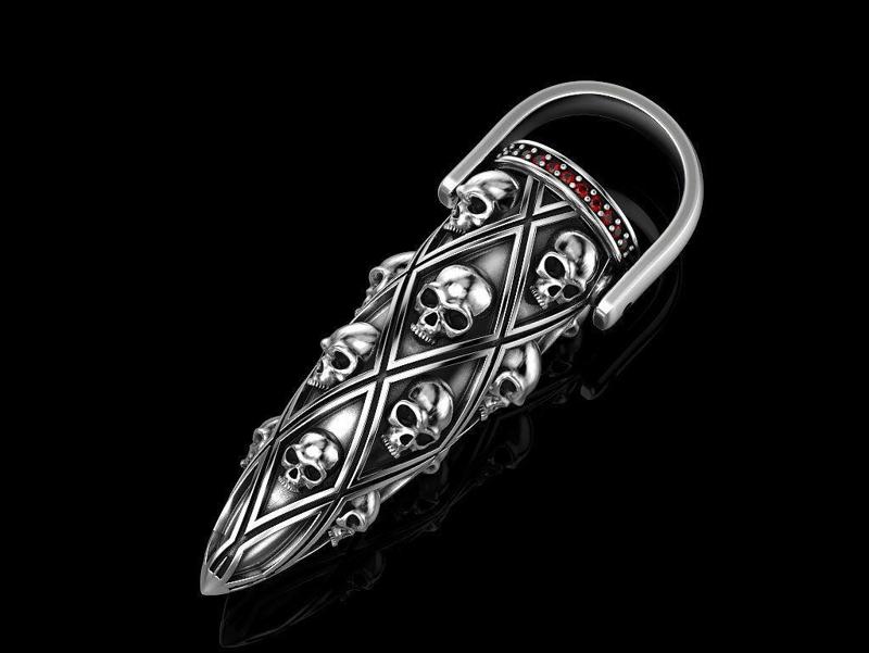 Bullet with skulls pendant