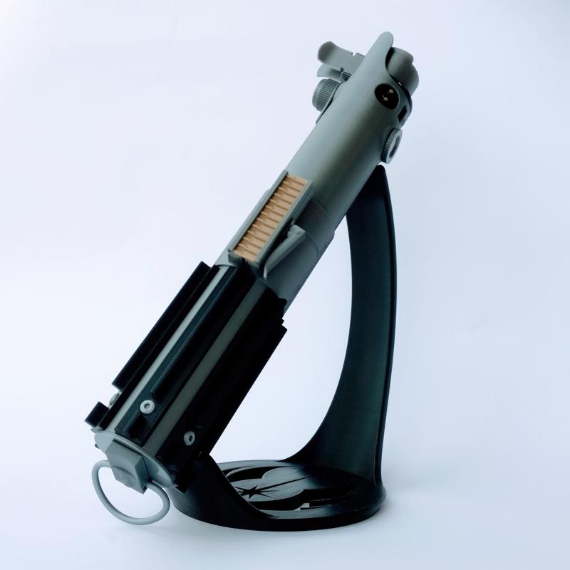 Tilted display stand for lightsaber hilt