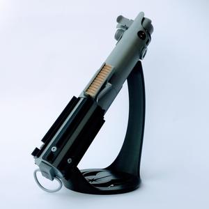 Tilted display stand for lightsaber hilt
