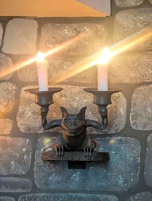 haunted mansion stretching room gargoyle sconce lamp 