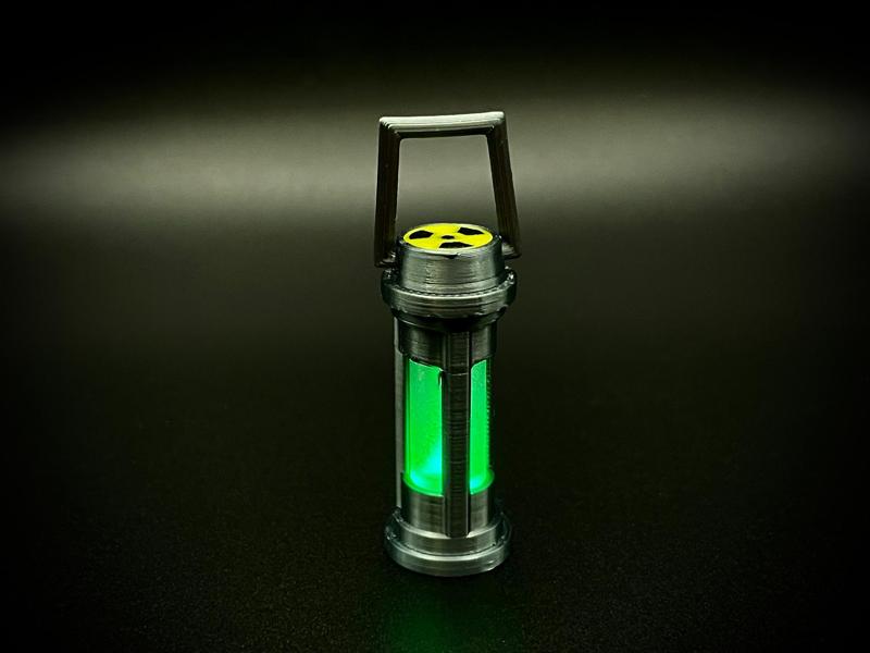 Glowing 'uranium' radioactive cartridge keyring