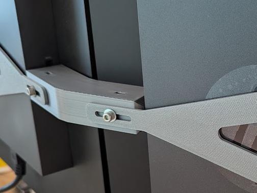 VESA monitor back-brace for dual-arm monitors
