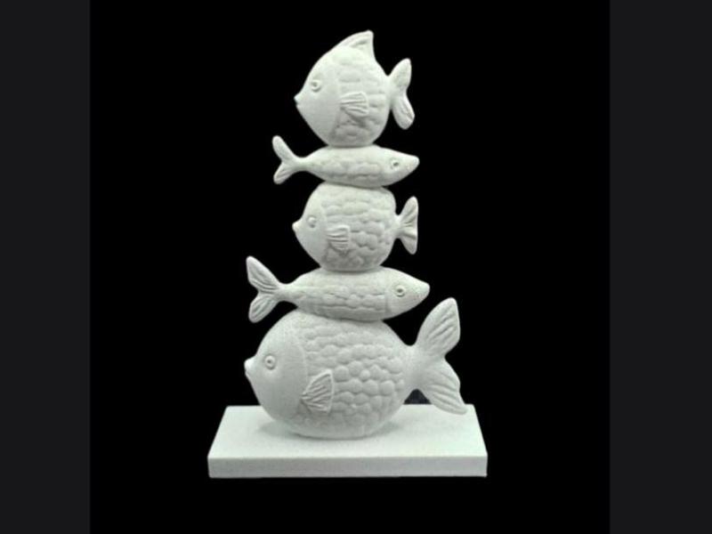 Decorative Fish Figurines on Pedestal