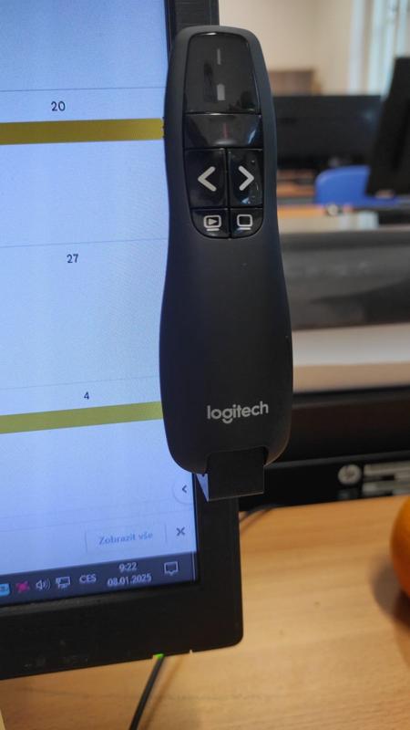 Logitech pointer/remote holder