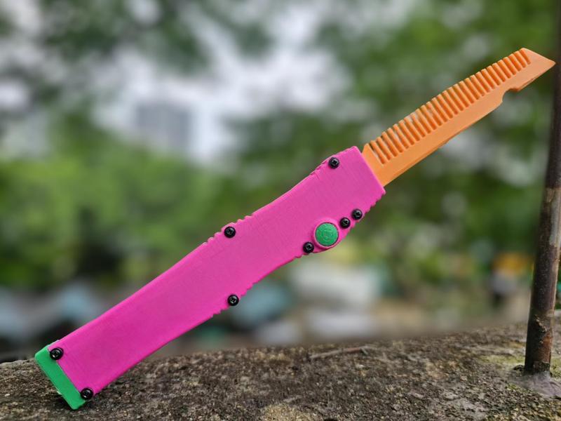 Microtech Halo OTF Auto Knife toy, a Microtech Halo single-action out-the-front comb toy