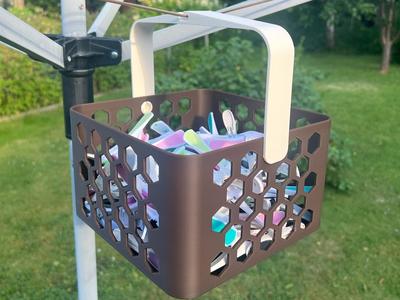 Basket with hanger for clothespins