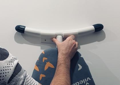 Wall Hanger for Ironing Board with curved legs