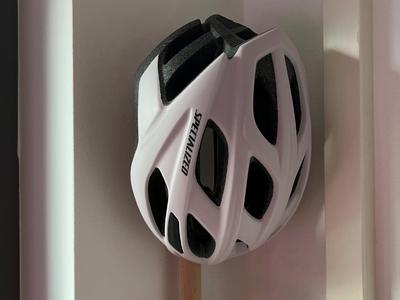 Helmet holder for bike gear rack