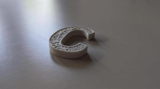 Standing Letter C in a Gypsum Floral Style