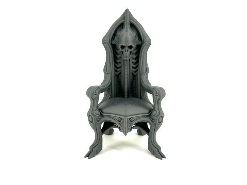 Gigerish chair / phone stand