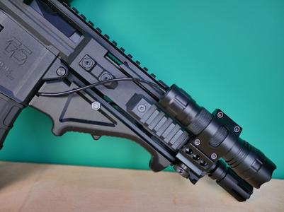 Angled foregrip with cable tidy hole