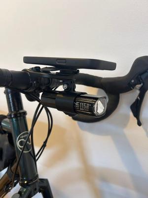 Flexible, adjustable flashlight holder for GoPro mounts