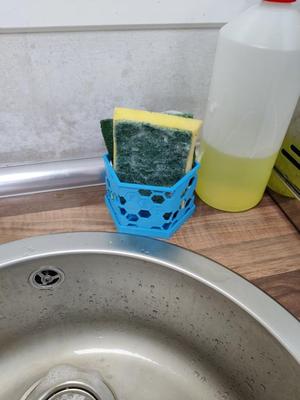 Scourer support - hexagonal grid