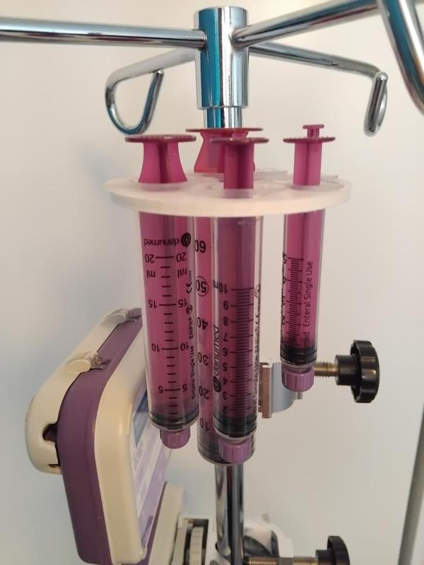 IV pole (enteral) syringe holder
