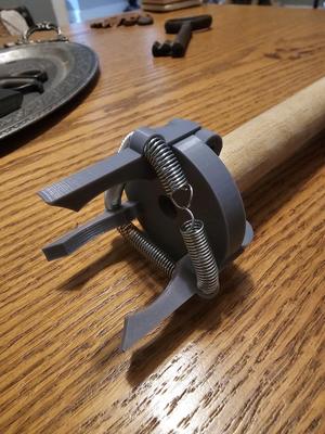 golf ball picker upper, using a spring