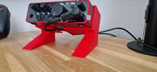 Focusrite Scarlett Solo 4th Gen desktop stand with headphone cableholder