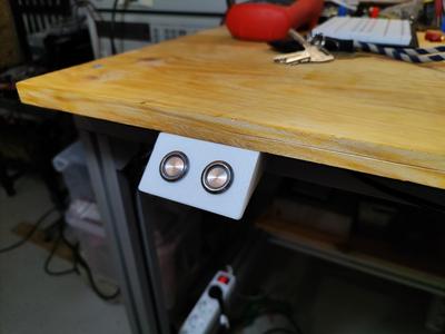 Under desk 2-button bracket (for 19mm round buttons)
