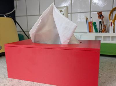 Tissue box with magnetic lid