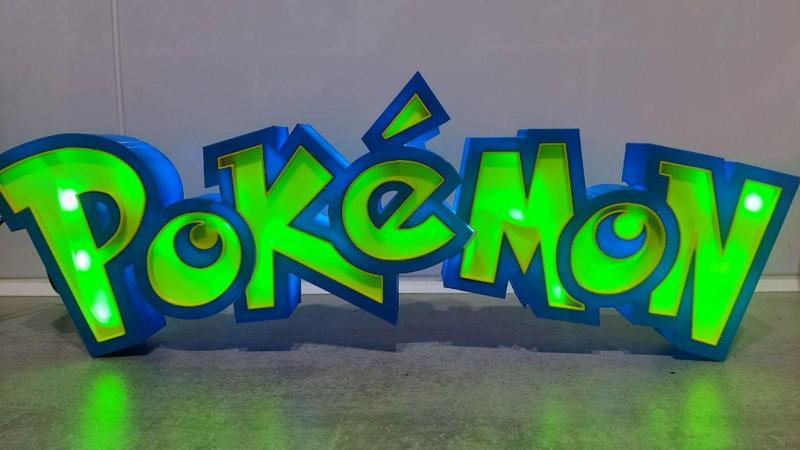 Pokemon logo illuminated display