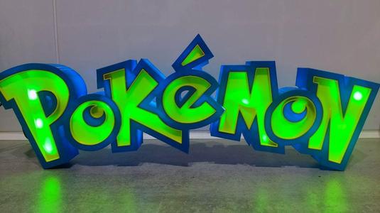 Pokemon logo illuminated display