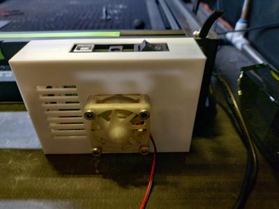 Laser engraver electronics cover with fan mount