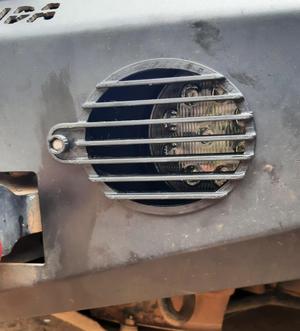 Pajero TR4 protetor farol neblina