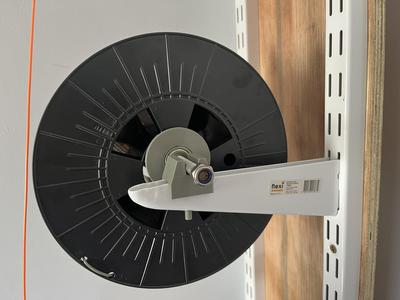 Another spool holder, fits on shelving rails (OpenSCAD)