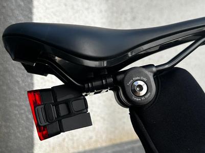 Universal bike light reflector holder at seat