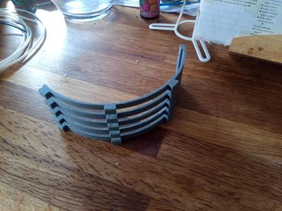 Large arch multi PTFE tube support.