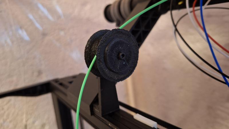 Pulley filament guide