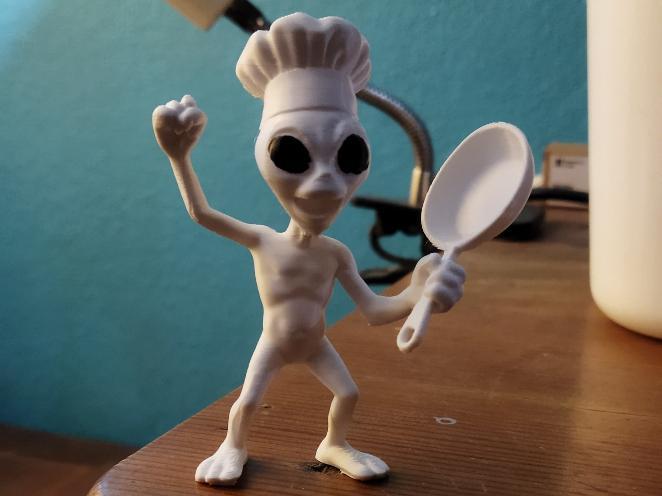 Happy Chef Alien, a Meal well Done