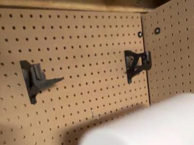 Pegboard paper towel roll quick change