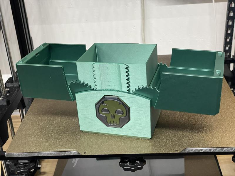 An oversized geared deck box for M:TG Planechase decks.
