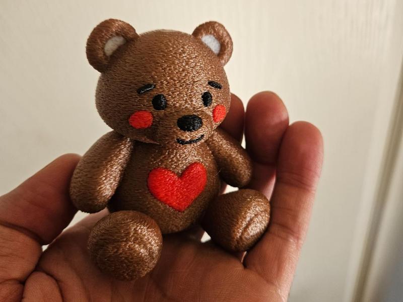 Teddy bear with heart, cuddly teddy bear, lucky charm bear