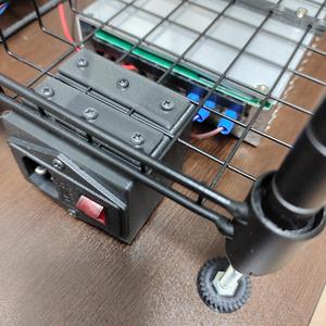 3-pin IEC320 C14 Inlet and fused switch module unit mounter under a DAISO Joint rack wire-meshed shelf