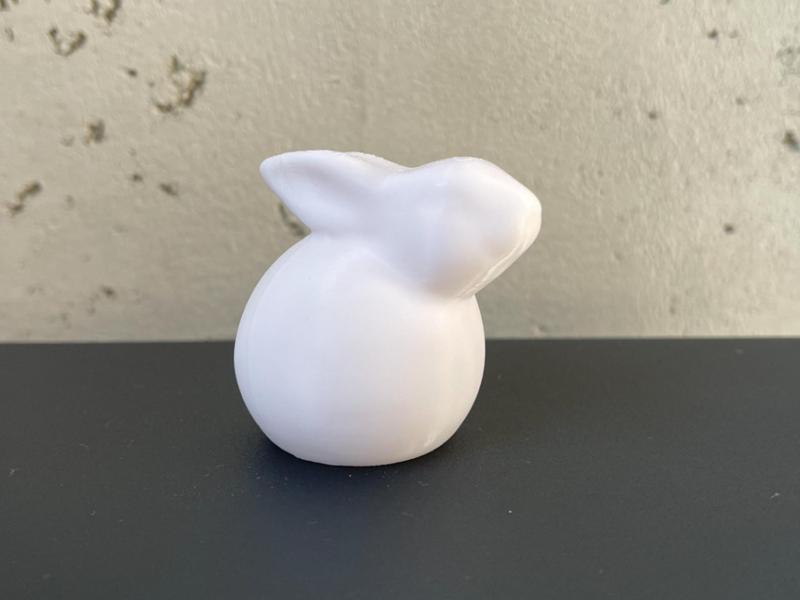 cute Easter bunny in the shape of an egg