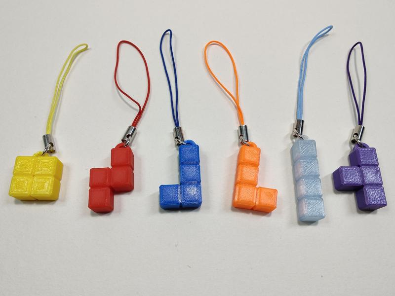 Tetromino charms