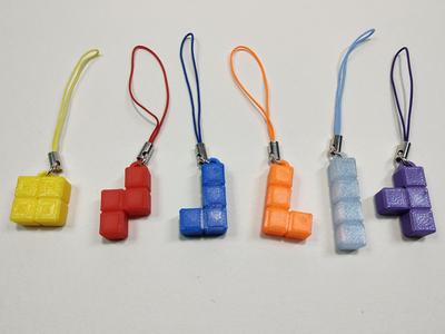 Tetromino charms