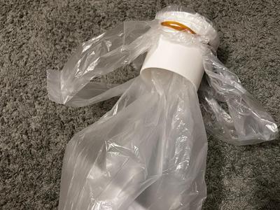Tool for a DIY vomit bag/sick bag