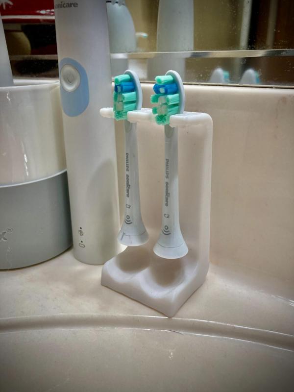 Electric Tooth Brush Head Holder