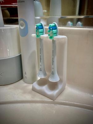 Electric Tooth Brush Head Holder