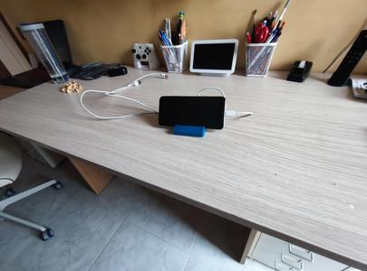 Mobile phone stand with cable and earbuds holder