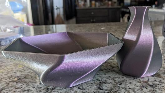 Twisted smooth vase and matching candy bowl.