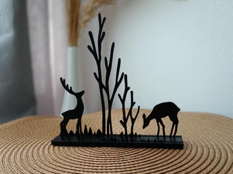 Deer and doe in a stand