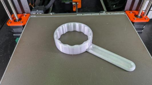 Wrench For Auto Rewinding Spool Holder   
