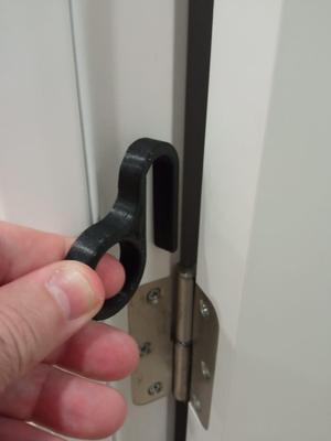 Door stop on hinge
